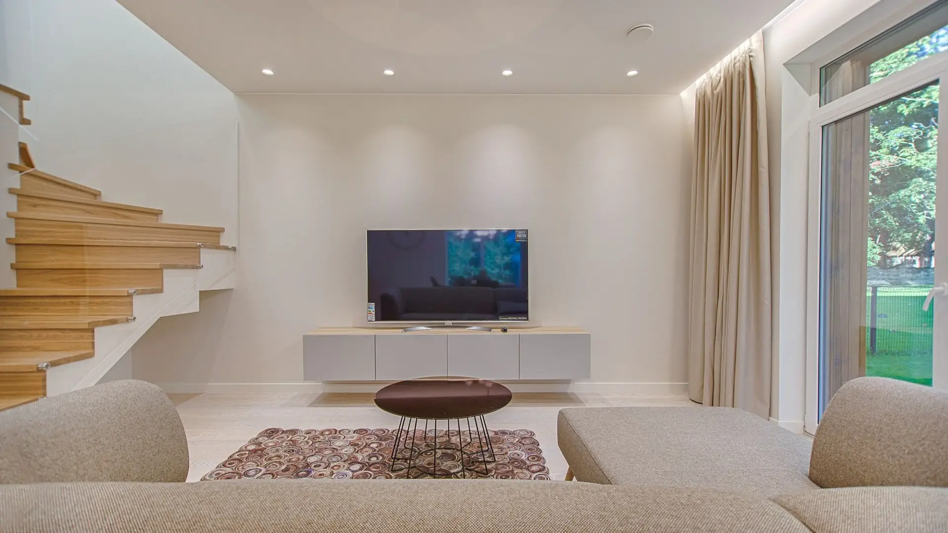 Living-room television display illustrating 4K marketing and how resolution naming shapes what customers buy.