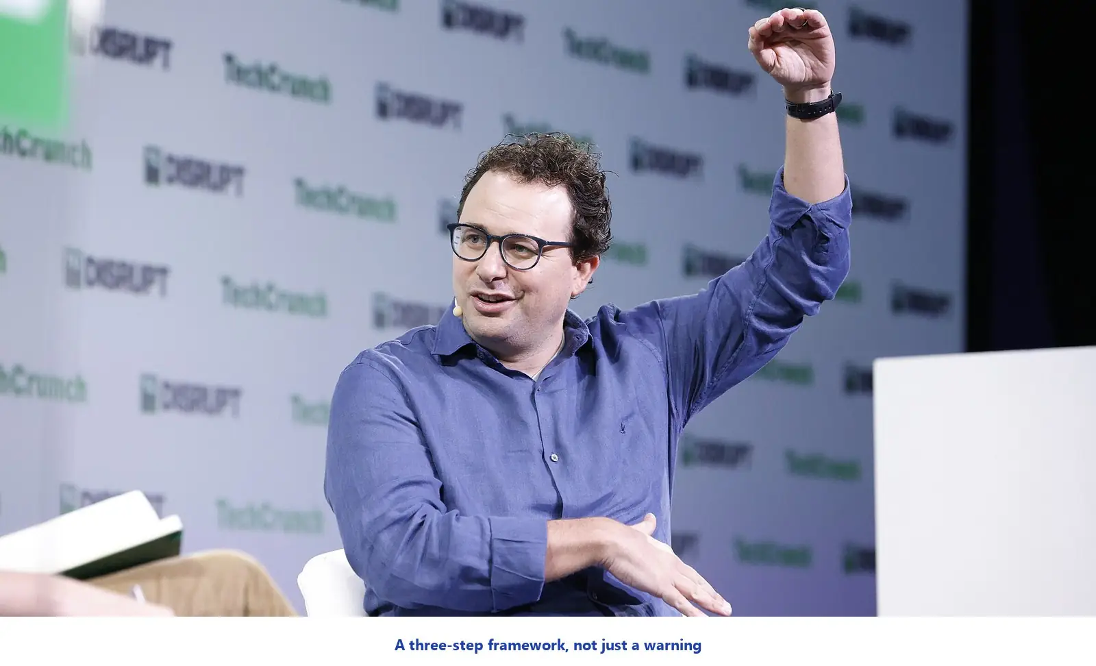 Dario Amodei photographed in coverage of his public call to slow the pace of AI capability development.