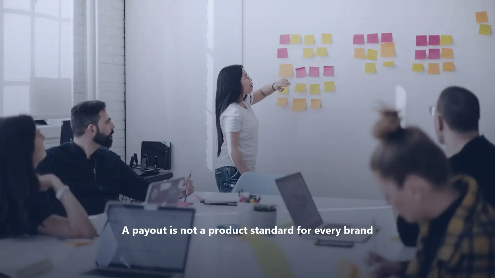 Product and marketing team reviewing strategy after Meta social media settlement news.