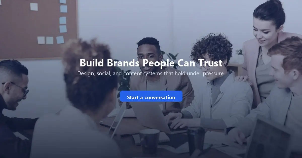 Team collaborating in a bright office, used as an end CTA about building trustworthy brand systems.
